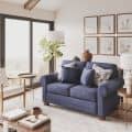 3D Renders of a Blue Sofa in a Light Interior