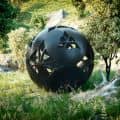 Black Clay Sphere in grass