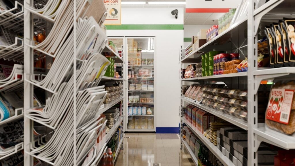 Convenience store aisle with stocked shelves